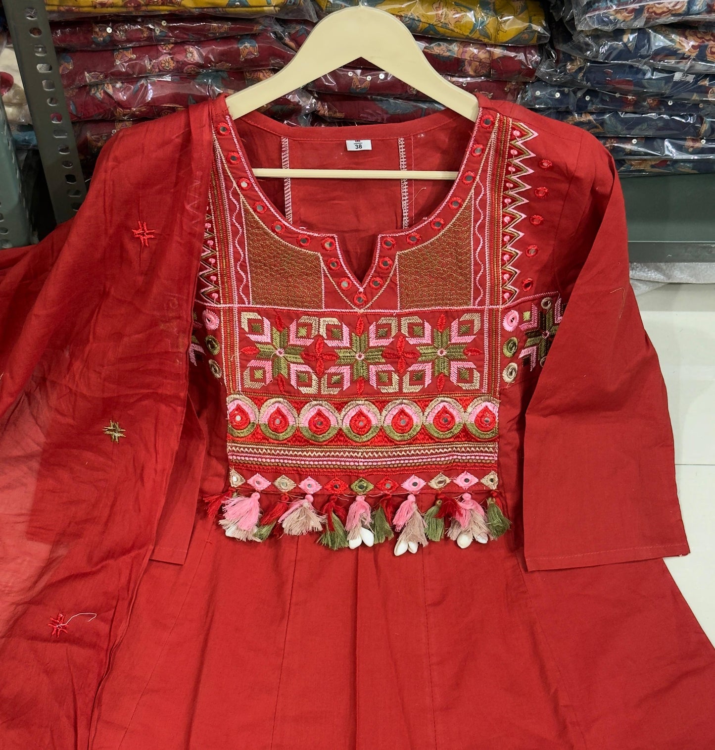 Maroon embroidered Anarkali Kurta set with matching dupatta, featuring intricate embroidery and traditional Indian design.